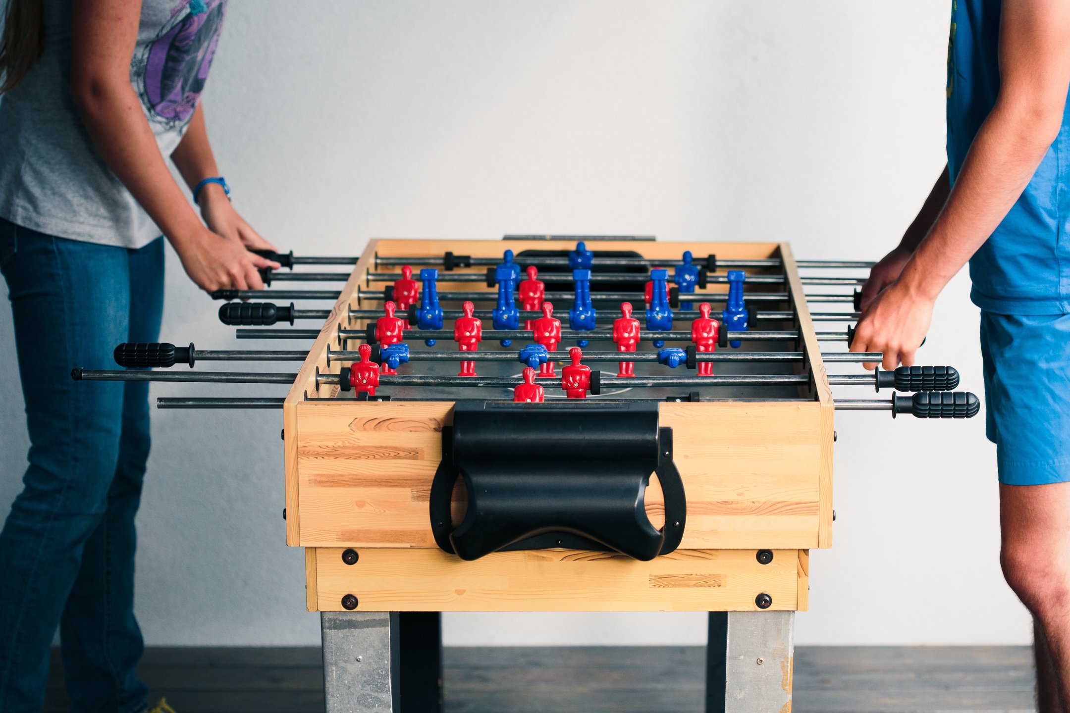 Teens Playing Foosball